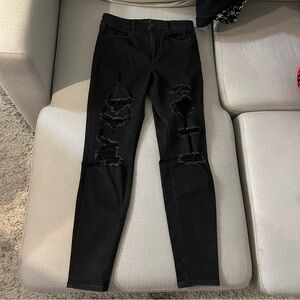 American Eagle Next Level Stretch Distressed Black Skinny Jeans